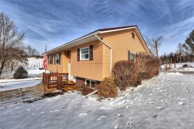 view of snow covered property