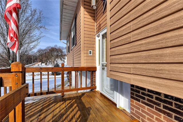 view of snow covered deck