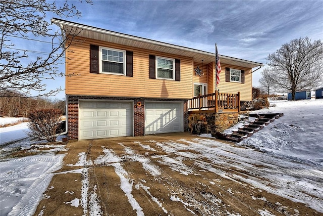 raised ranch featuring a garage