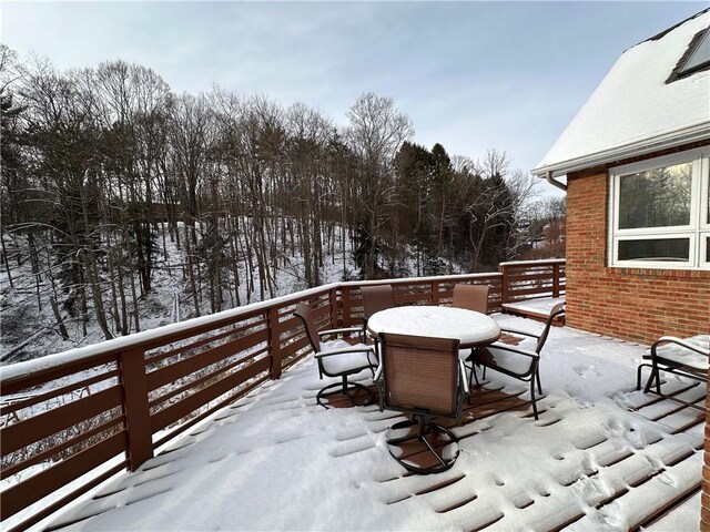 view of snow covered patio