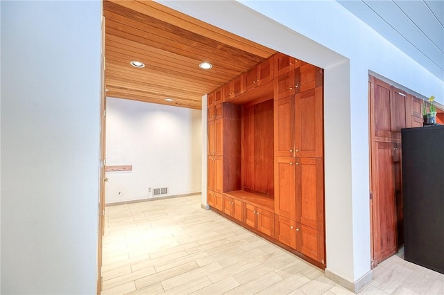 hallway with wood ceiling