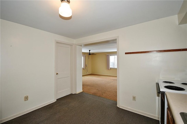 interior space with dark colored carpet