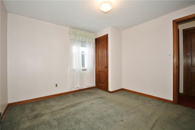 spare room with carpet floors