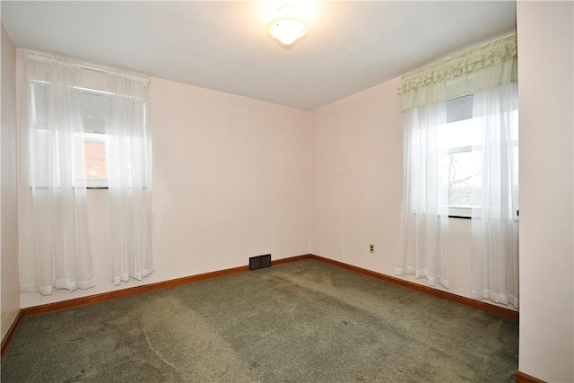 unfurnished room with carpet