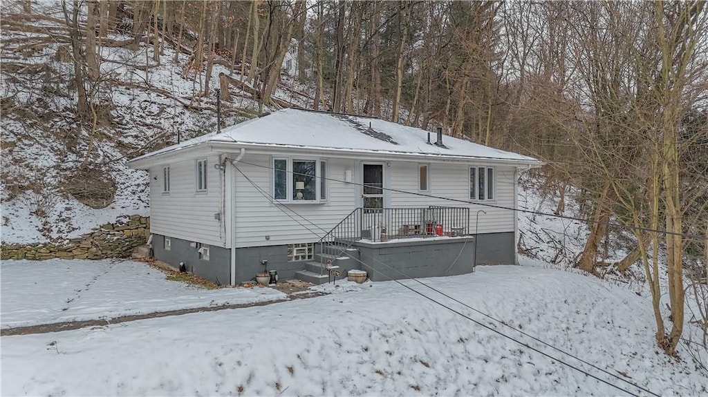 view of snow covered house