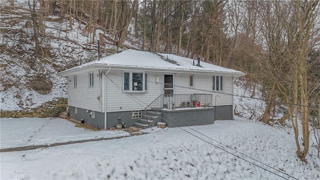 view of snow covered house