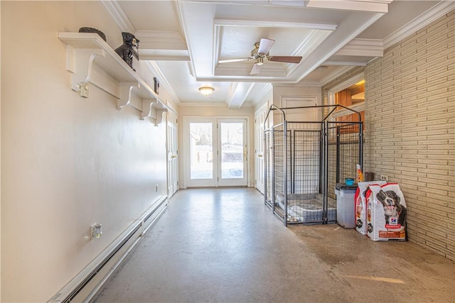 garage featuring ceiling fan and baseboard heating