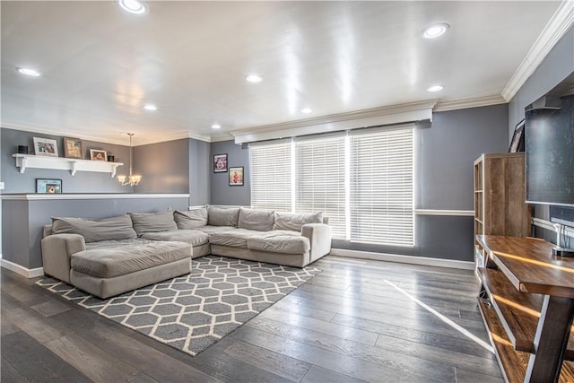 living room with ornamental molding, dark hardwood / wood-style flooring, and a notable chandelier