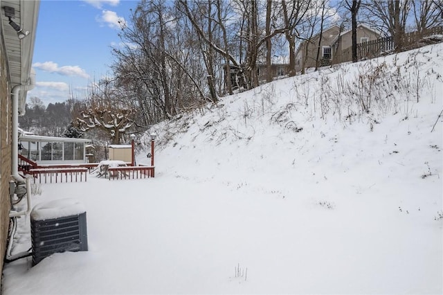 view of yard covered in snow