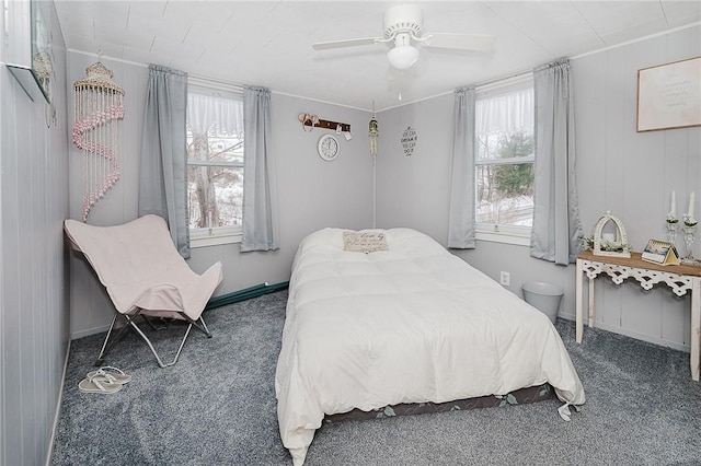 carpeted bedroom with ceiling fan