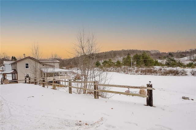 view of yard covered in snow