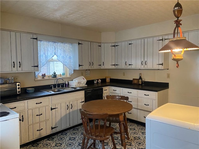 kitchen with electric range oven, dishwasher, washer / dryer, sink, and hanging light fixtures