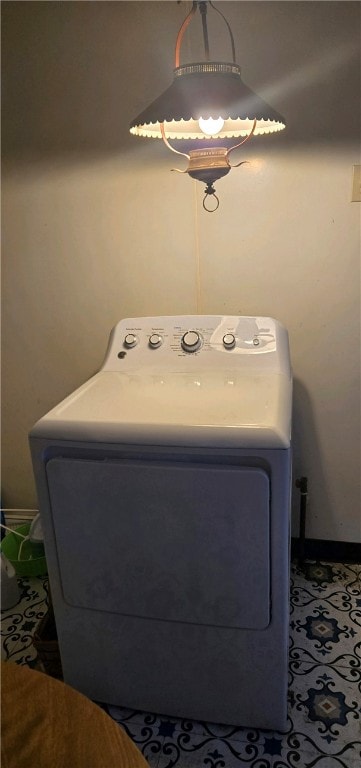 laundry room with washer / dryer