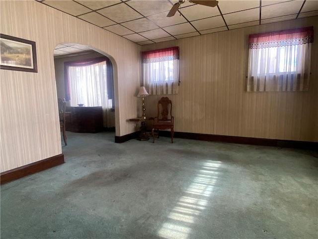 spare room with carpet floors and ceiling fan