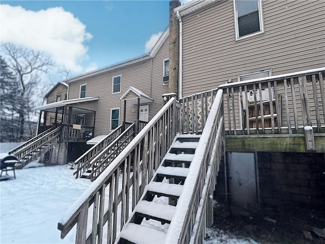 view of snow covered property