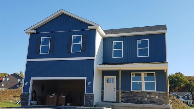 view of front of property with a garage