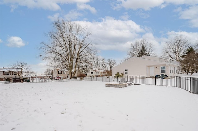 view of yard covered in snow