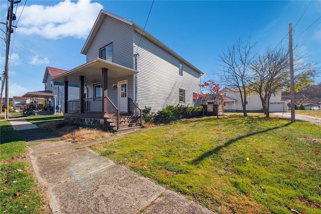 exterior space featuring a front lawn and a porch