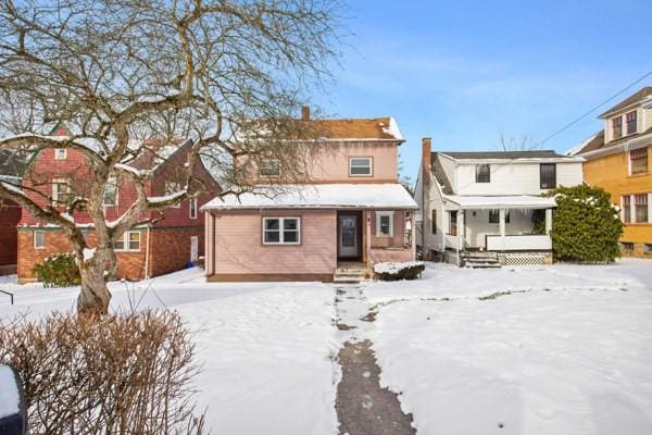 view of snow covered house