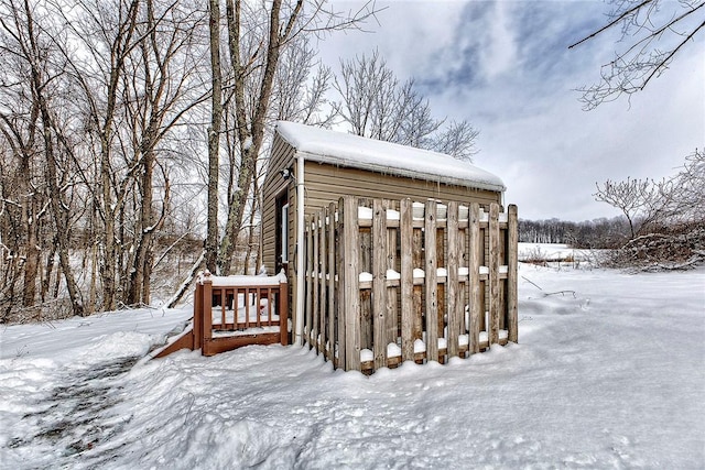 view of yard covered in snow