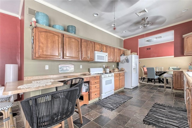 kitchen with ceiling fan, white appliances, and ornamental molding