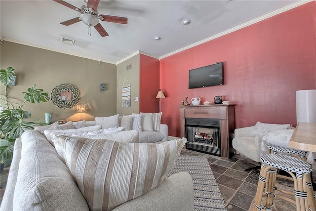 bedroom with ceiling fan and crown molding