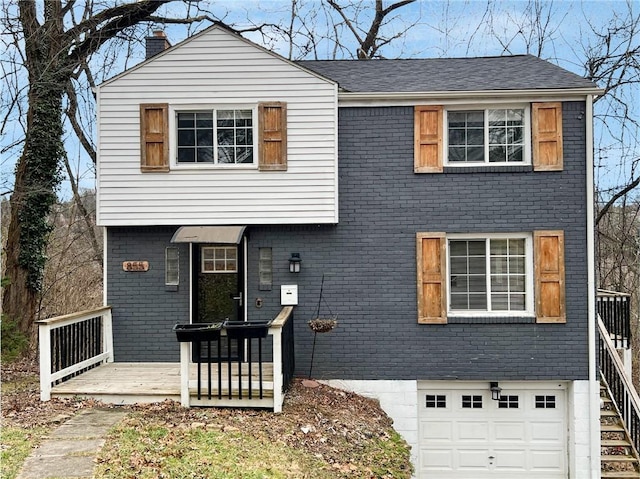 view of front of home with a garage