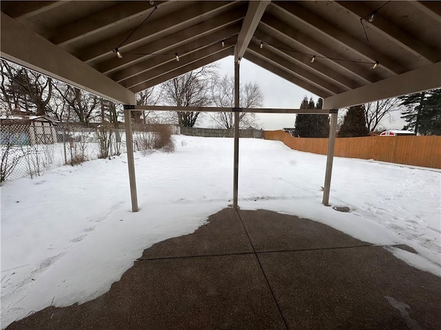 view of snow covered patio