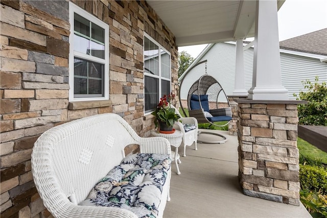 view of patio featuring a porch