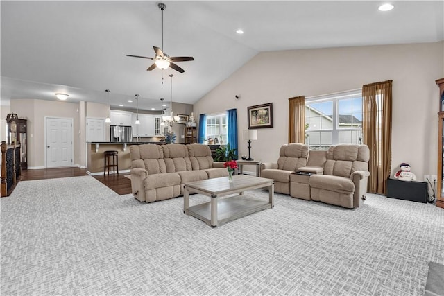 living room with vaulted ceiling and ceiling fan