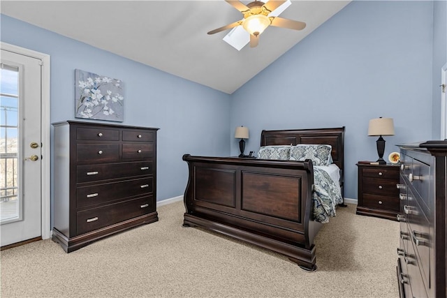 carpeted bedroom with ceiling fan and lofted ceiling