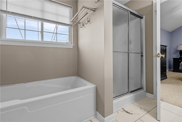 bathroom with shower with separate bathtub