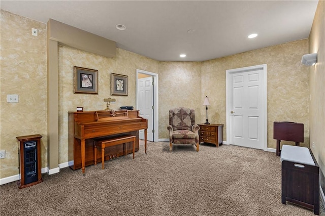 living area featuring carpet flooring