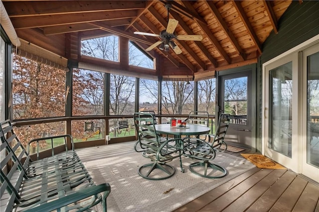 unfurnished sunroom with vaulted ceiling with beams, ceiling fan, and wood ceiling