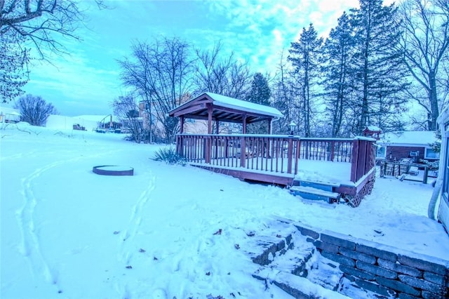 view of snow covered deck