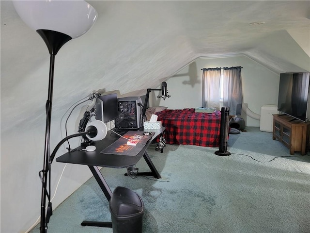 exercise area with vaulted ceiling and carpet