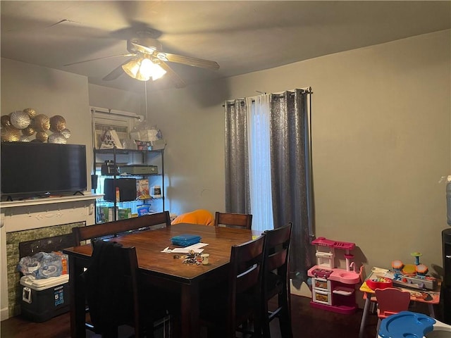 dining room featuring ceiling fan