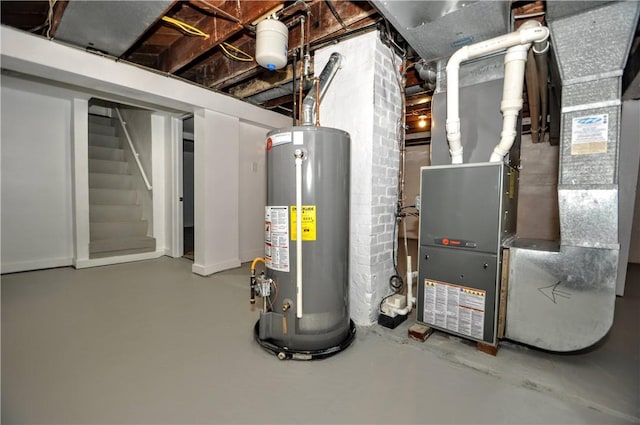 utility room featuring gas water heater and heating unit