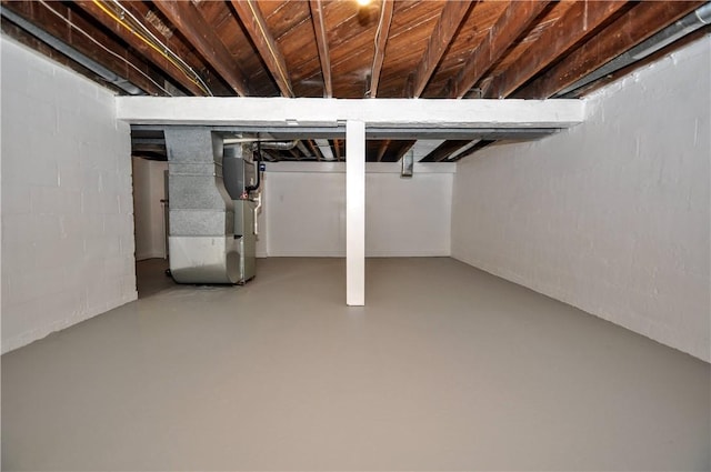 basement featuring heating unit