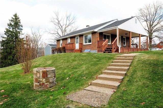 exterior space featuring a porch and a front lawn