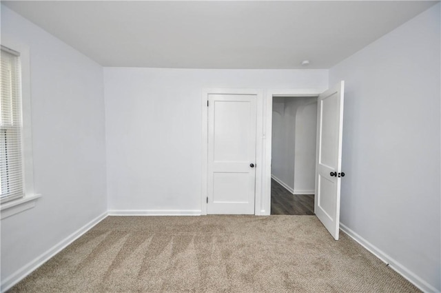 spare room with carpet