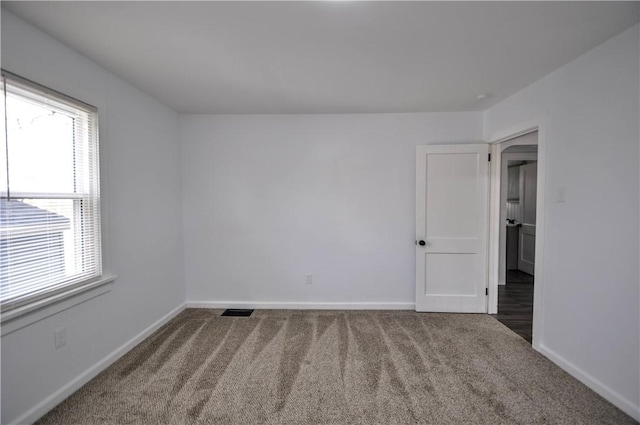 view of carpeted spare room