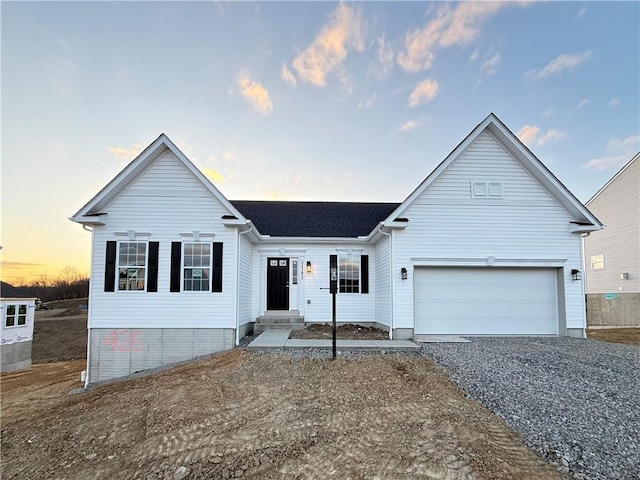 ranch-style home with entry steps and driveway