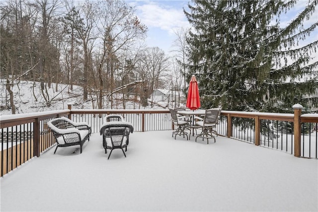 view of snow covered deck