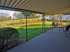 view of patio featuring fence