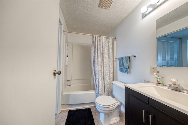 full bathroom with vanity, a textured ceiling, toilet, and shower / bath combo with shower curtain