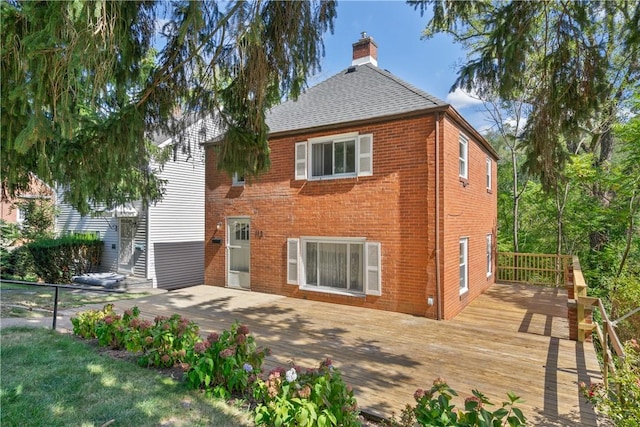 view of front of house featuring a wooden deck