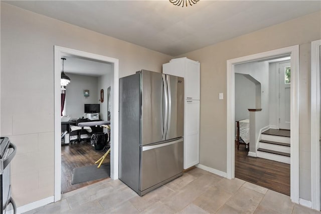 kitchen featuring white cabinets and stainless steel appliances