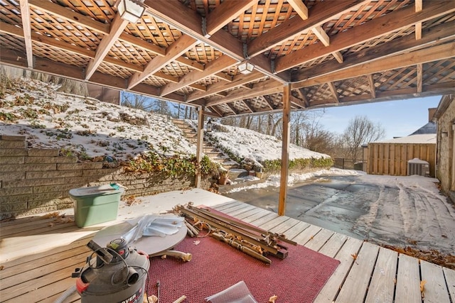 view of snow covered deck