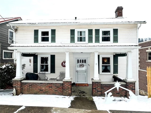 view of front of home featuring cooling unit